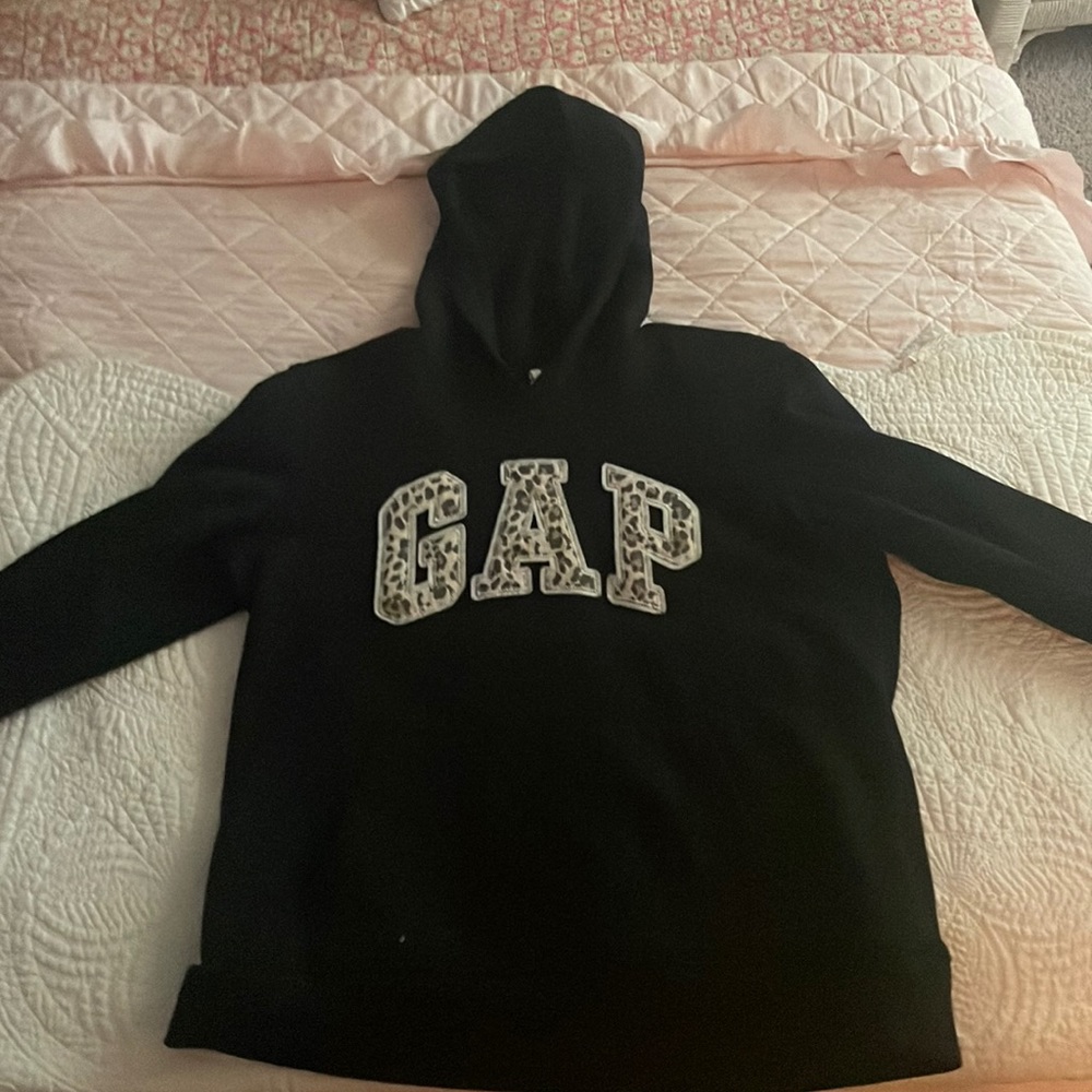 A gap hoodie with cheetah print